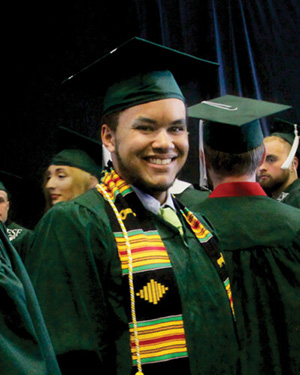 James Lee in graduation regalia