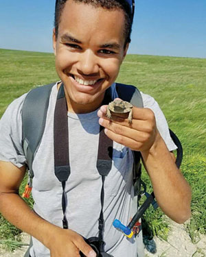 James Lee holding a horned lizard
