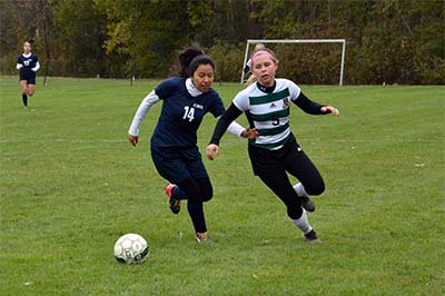 Lindsay Eberhart playing soccer
