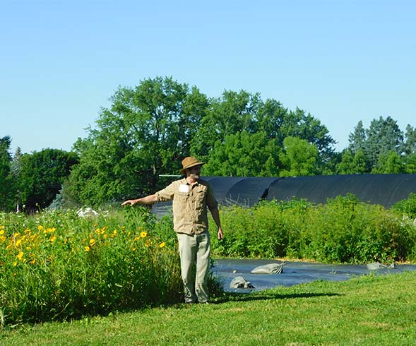 Sam Quinn in a meadow