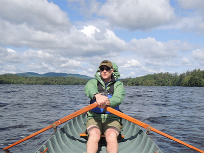 Paul Hai rowing one of ESF's guide boat