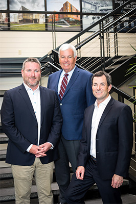 Charles Breuer, Executive Vice President, Jim Breuer, Chairman, and Andy Breuer, President