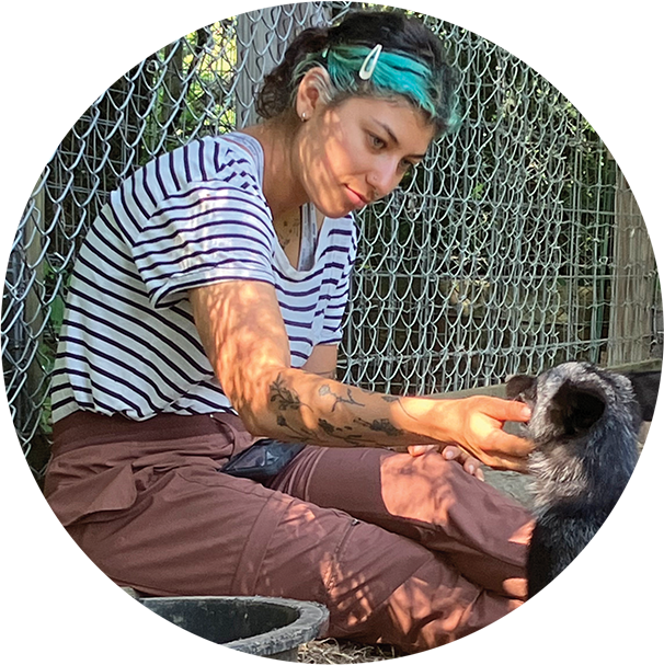 Kaylee Lupowitz holding a wolf