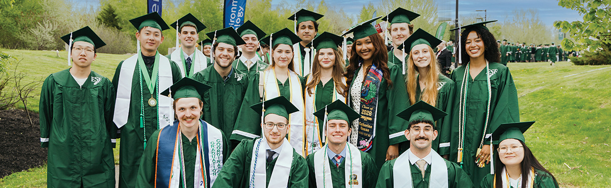 group of graduates in caps and gowns