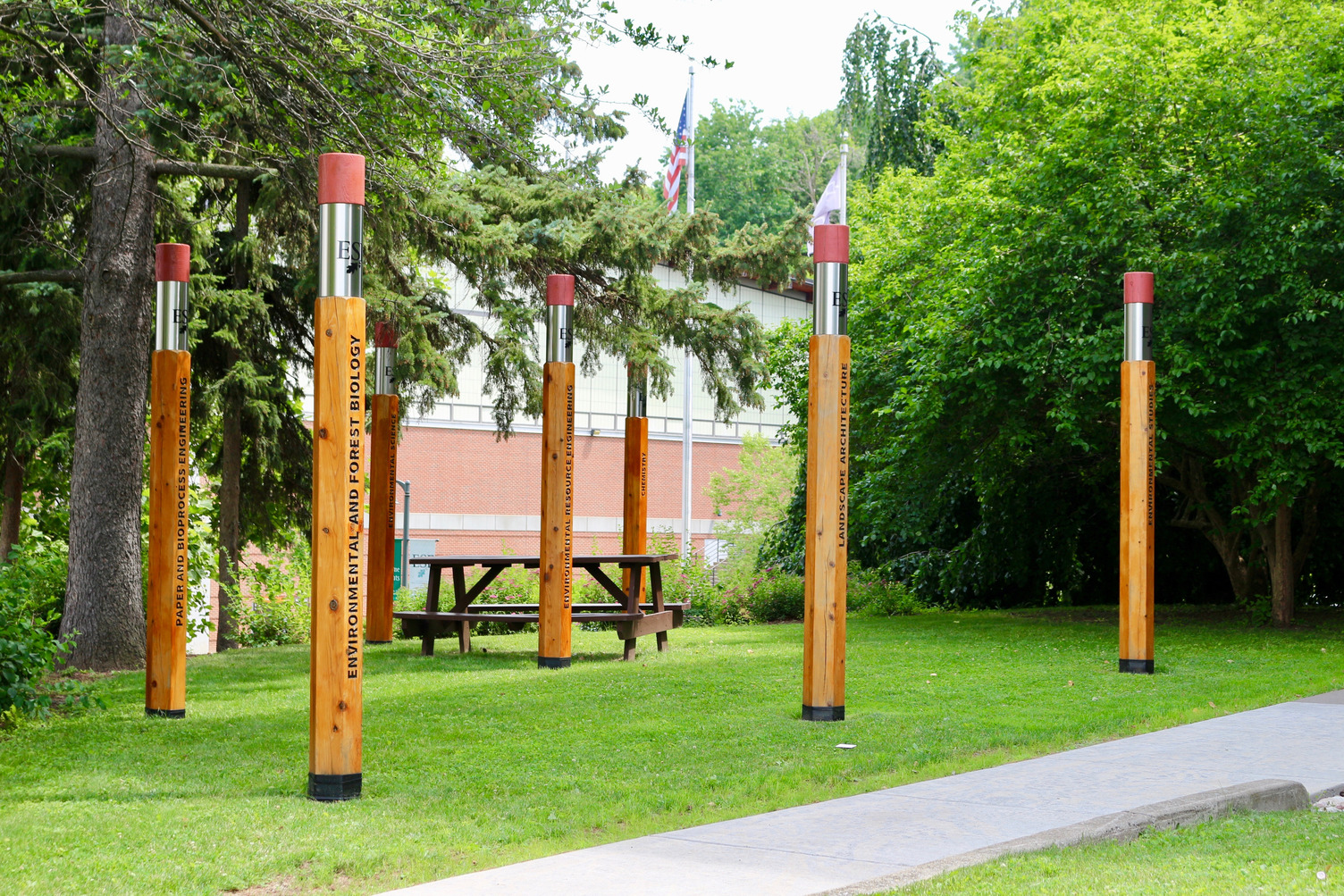 Pencil shaped columns with names of academic departments at ESF