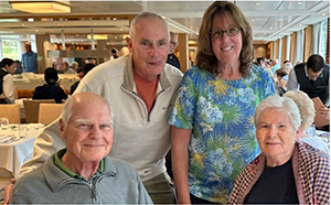 John and Joan Coffey (standing) with Ken and Kathy Kugel
